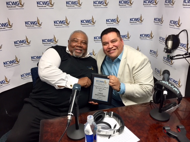 Chris at KCWG radio with award